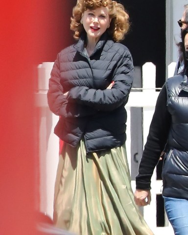 Long Beach, CA - *EXCLUSIVE* - Nicole Kidman and Javier Bardem take a break from filming 'Being the Ricardos'' at the Queen Mary in Long Beach.The Aaron Sorkin-directed film follows late comedy icon Lucille Ball (Kidman) and her husband Desi Arnaz (Bardem). The pair were seen chatting closely on set with Bardem in a tux and Kidman in a wine colored dress, her eyebrows plucked thin and her makeup mirroring the the comedic icon’s famous look perfectly.Pictured: Nicole KidmanBACKGRID USA 27 APRIL 2021 USA: +1 310 798 9111 / usasales@backgrid.comUK: +44 208 344 2007 / uksales@backgrid.com*UK Clients - Pictures Containing ChildrenPlease Pixelate Face Prior To Publication*