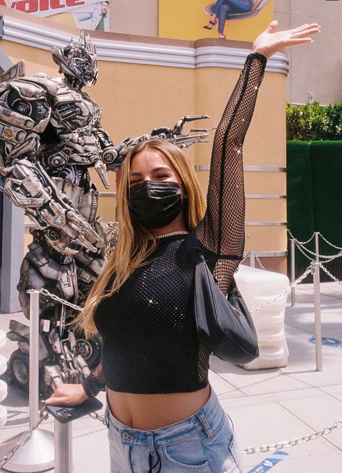 Addison Rae wears the same Alice + Olivia top as Kourtney Kardashian