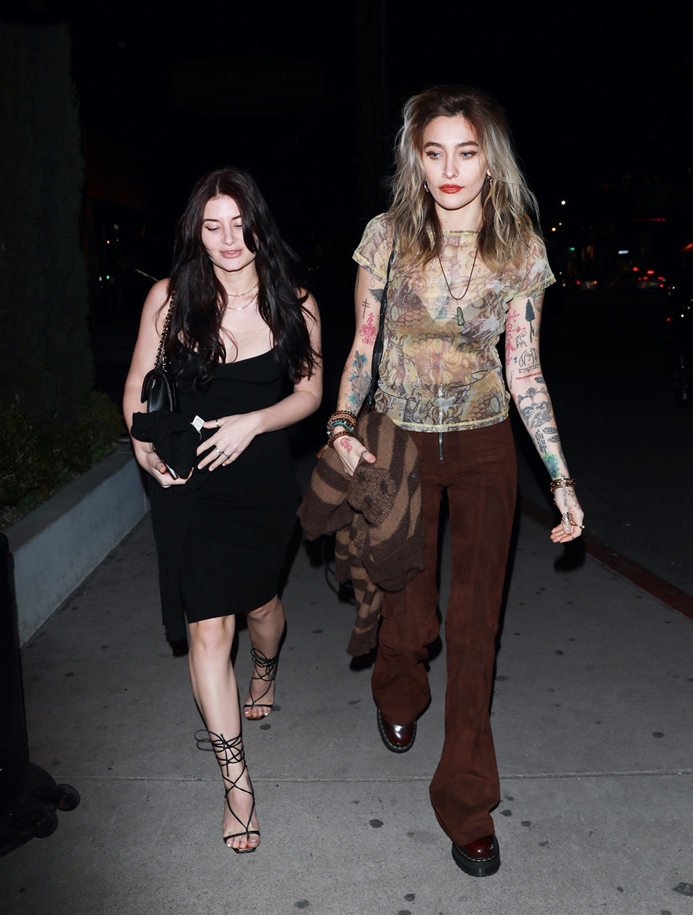 Paris Jackson grabs a bite at West Hollywood's Catch Steak LA with a female companion!