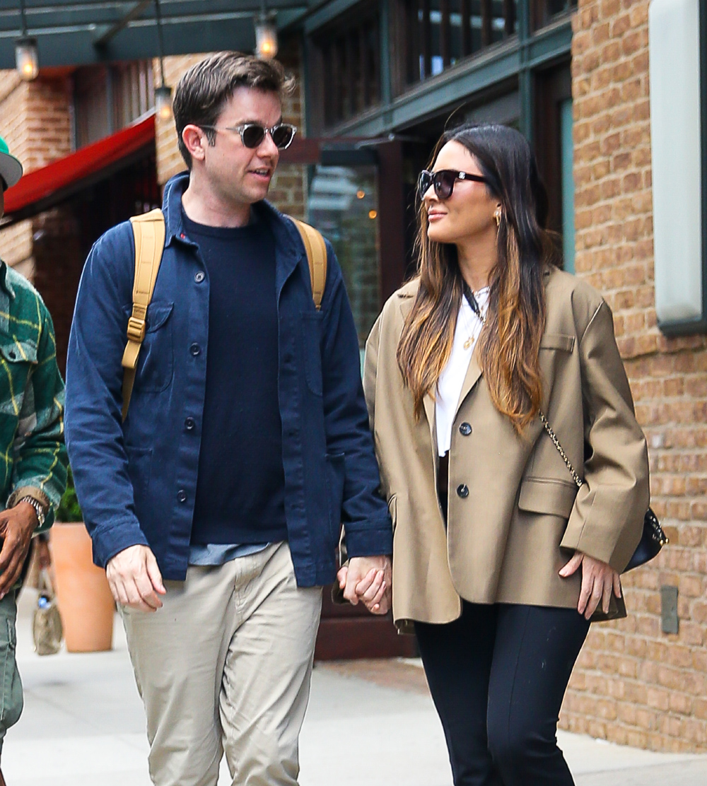 Olivia Munn and John Mulaney seen holding hands as leaving their hotel in New York City