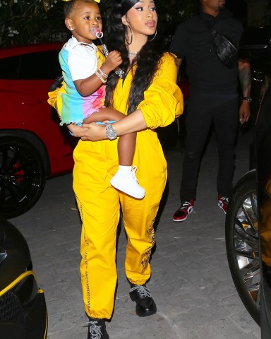 *EXCLUSIVE* Beverly Hills, CA  - Cardi B and daughter Kulture was seen in rare form as she attended Teyana Taylor’s exclusive listening party for her new album entitled “The Album”. Cardi looks chic as she sports the signature custom hazmat suit created for Teyana’s guest. Offset arrived later and the 3 enjoyed their time with Teyana’s daughter and others who attended the listening party. As seen in the picture, Offset embraces his daughter and smiles for the camera with Cardi B behind him.

Pictured: Cardi B

BACKGRID USA 17 JUNE 2020 

BYLINE MUST READ: NYP/BLM / BACKGRID

USA: +1 310 798 9111 / usasales@backgrid.com

UK: +44 208 344 2007 / uksales@backgrid.com

*UK Clients - Pictures Containing Children
Please Pixelate Face Prior To Publication*