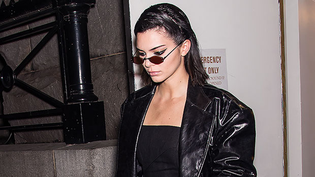 Kendall Jenner wearing jean bermuda shorts