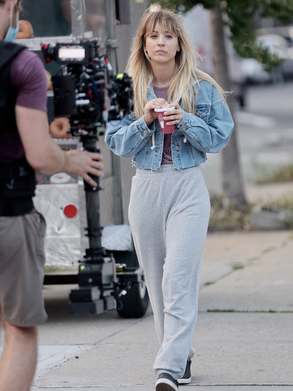 Kaley Cuoco films a scene where she gets hit by a car filming “Meet Cute” with Pete Davidson.