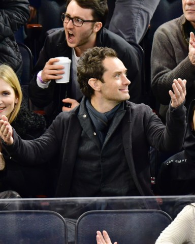 Phillipa Coan, Jude Law and Iris LawCelebrities at New Jersey Devils v New York Rangers, NHL ice hockey match, Madison Square Garden, New York, USA - 18 Dec 2016