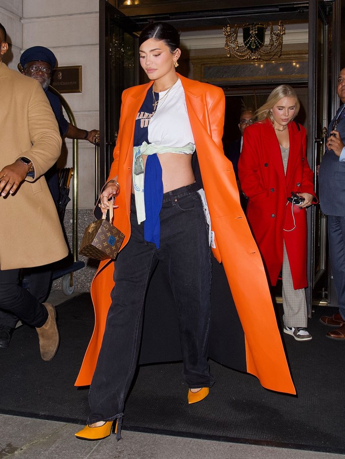 Kylie Jenner wears an orange coat in NYC