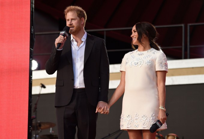 Prince Harry & Meghan Markle holding hands