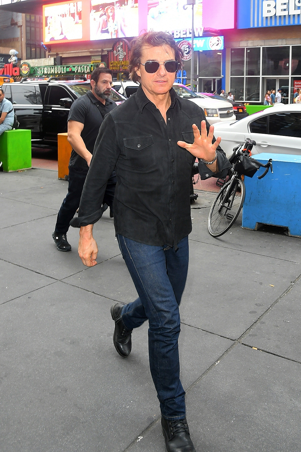 *EXCLUSIVE* Was Suri invited?  Tom Cruise arrives at AMC in Times Square with son Connor and sister Lee.