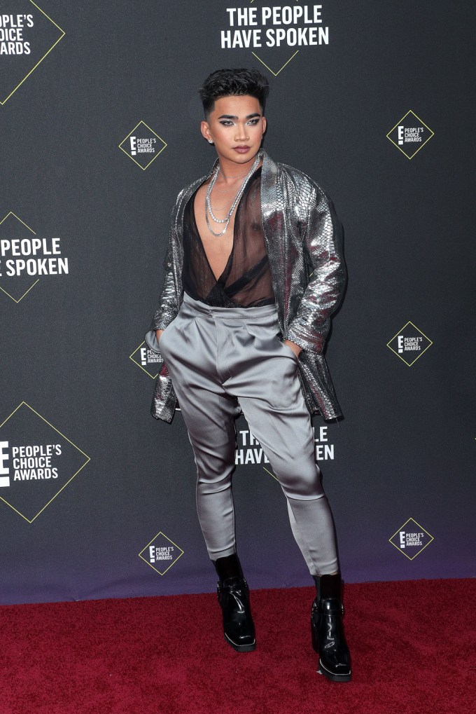 Bretman Rock in a silver outfit