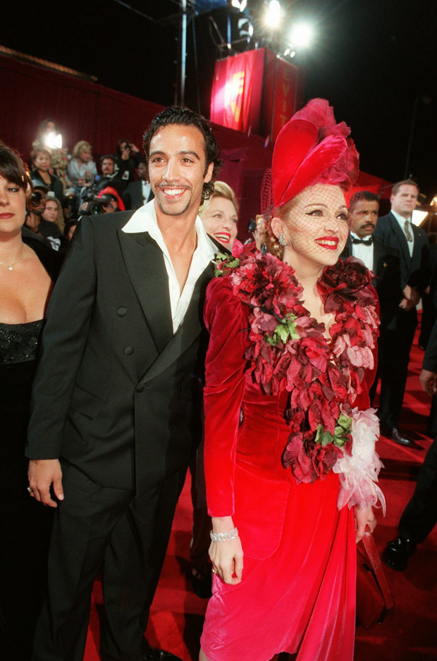 CARLOS LEON MADONNA Evita" star Madonna and Carlos Leon, father of their infant daughter, arrive for the film's premiere, at the Shrine Auditorium in Los AngelesEVITA OPENING, LOS ANGELES, USA