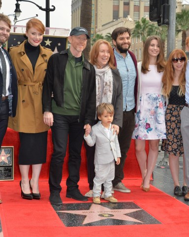 LOS ANGELES, CA - DECEMBER 10, 2015: Director Ron Howard & wife Cheryl, daughter Bryce Dallas Howard & family at Ron Howard's Hollywood Walk of Fame star ceremony; Shutterstock ID 392883982; purchase_order: Photo; job: Farrah