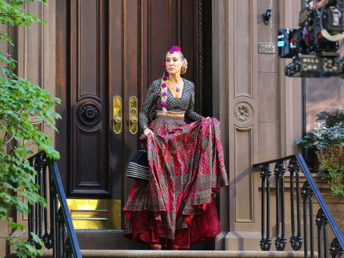 Sarah Jessica Parker in front of doors