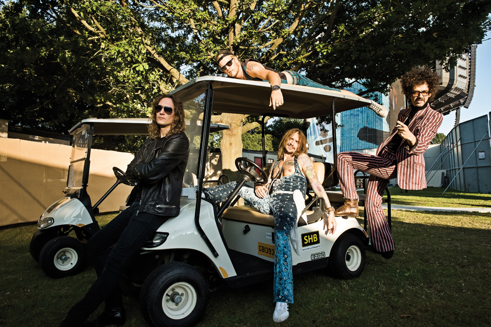 Editorial Use OnlyMandatory Credit: Photo by Classic Rock Magazine/Future/Shutterstock (10719404b)(L-R) Dan Hawkins, Rufus Taylor, Justin Hawkins and Frankie Poullain of British rock group The Darkness, photographed at Chantry Park in Ipswich on August 23, 2019The Darkness Portrait & Live Shoot, Ipswich, UK - 23 Aug 2019