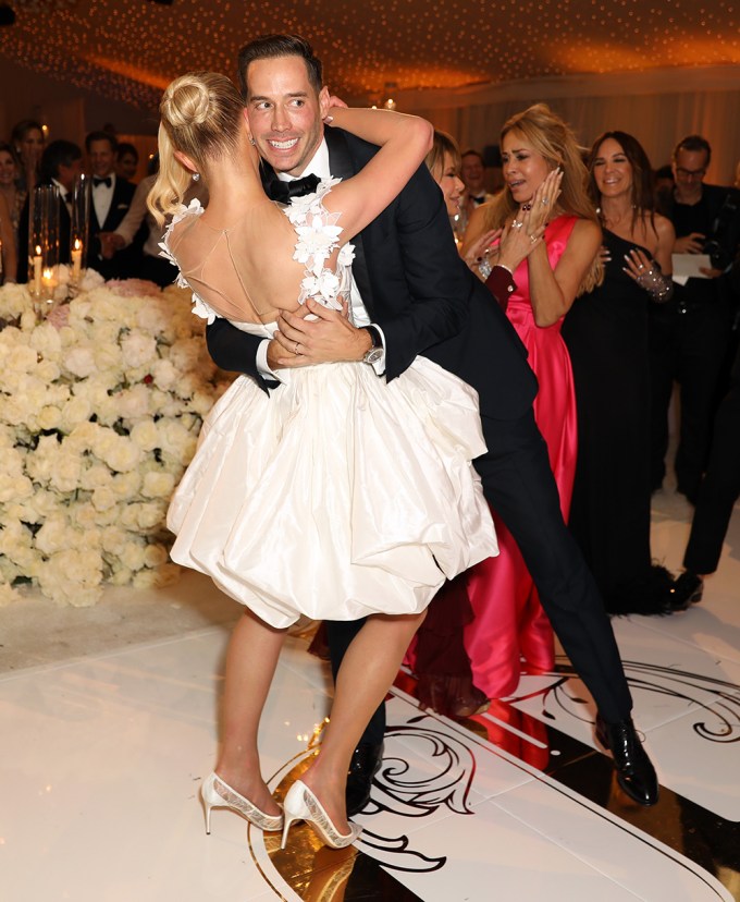 Paris Hilton and Carter Reum hugging