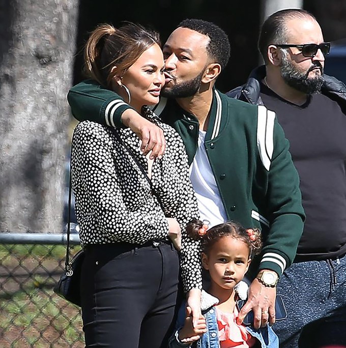 John Legend Smooches Chrissy in LA