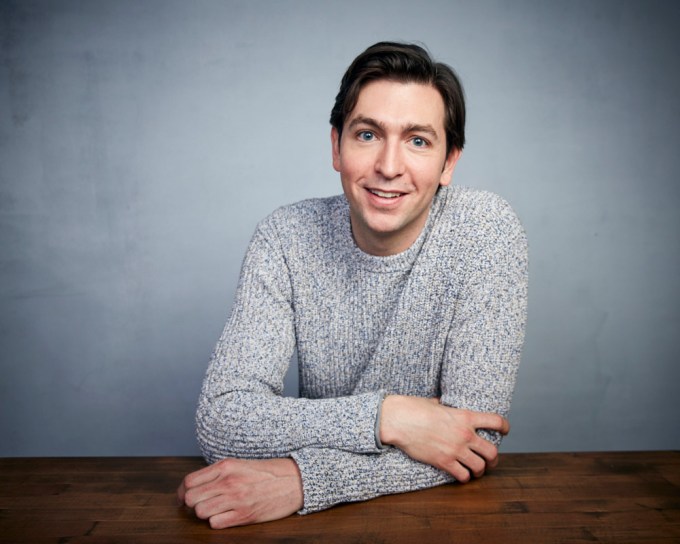 Nicholas Braun smiles for a photo