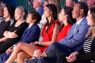 Tiger Woods sits with his family from left; his mother Kultida Woods, son Charlie Woods, daughter Sam Woods and his girlfriend Erica Herman during his induction into the World Golf Hall of Fame, in Ponte Vedra Beach, Fla
Hall of Fame Golf, Ponte Vedra Beach, United States - 09 Mar 2022