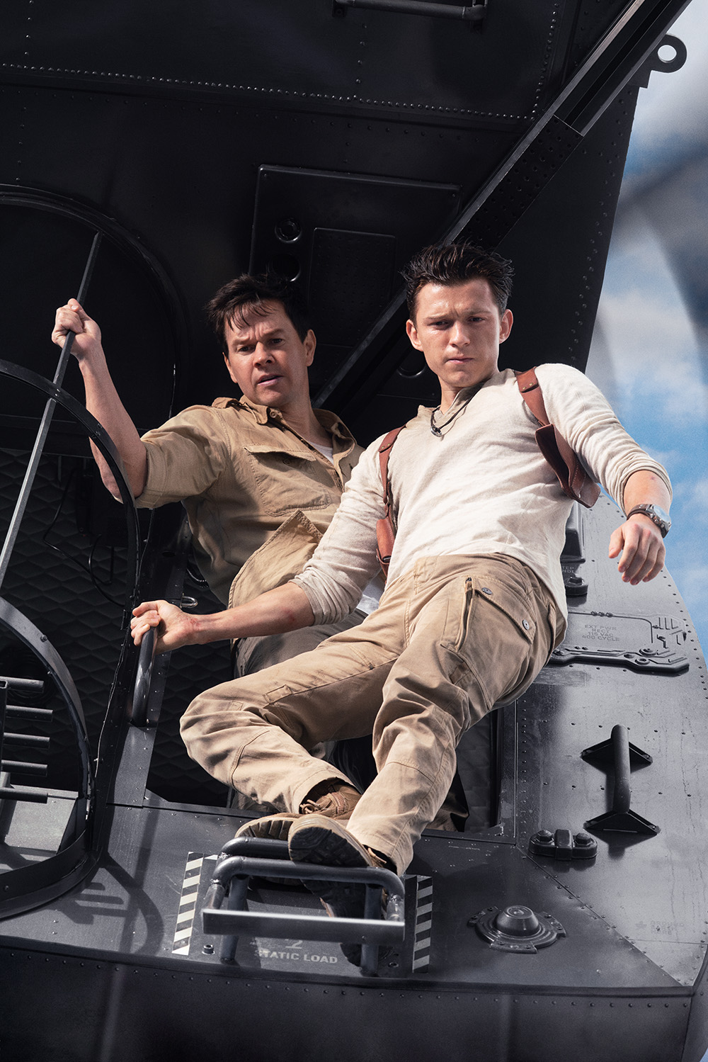 Mark Wahlberg stars as Victor “Sully” Sullivan and Tom Holland is Nathan Drake in Columbia Pictures' UNCHARTED.  Photo by: Clay Enos