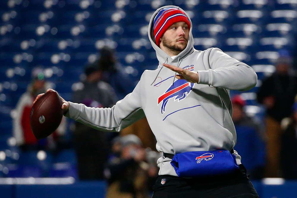 Buffalo Bills quarterback Josh Allen (17) warms up prior to the first half of an NFL wild-card playoff football game against the New England Patriots in Orchard Park, N.Y
Patriots Bills Football, Orchard Park, United States - 15 Jan 2022