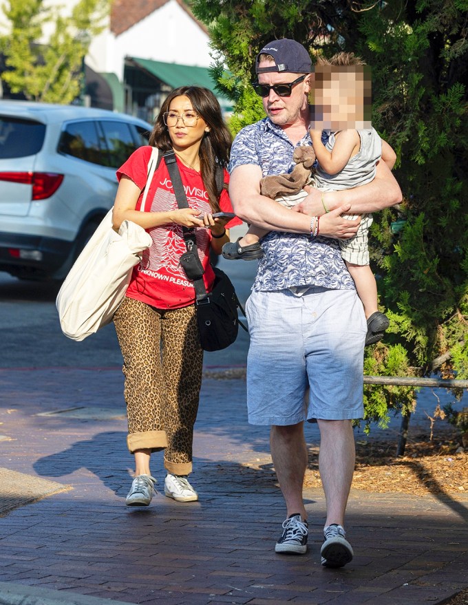 Macaulay Culkin and Brenda Song bring their son to a farmer’s market