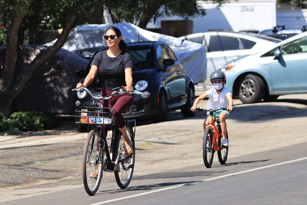 EXCLUSIVE: Simon Cowell’s partner Lauren Silverman enjoys a bike ride with her sons Eric and Adam in Malibu. 08 Aug 2020 Pictured: Lauren Silverman enjoys a bike ride with her sons. Photo credit: Rachpoot/MEGA TheMegaAgency.com +1 888 505 6342 (Mega Agency TagID: MEGA693253_003.jpg) [Photo via Mega Agency]