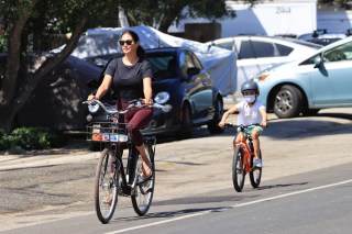 EXCLUSIVE: Simon Cowell’s partner Lauren Silverman enjoys a bike ride with her sons Eric and Adam in Malibu. 08 Aug 2020 Pictured: Lauren Silverman enjoys a bike ride with her sons. Photo credit: Rachpoot/MEGA TheMegaAgency.com +1 888 505 6342 (Mega Agency TagID: MEGA693253_003.jpg) [Photo via Mega Agency]