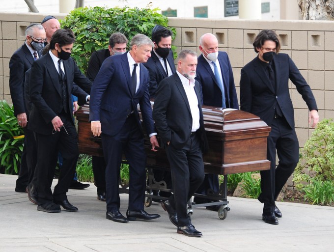 Friends & Family Carry The Casket Of Bob Saget