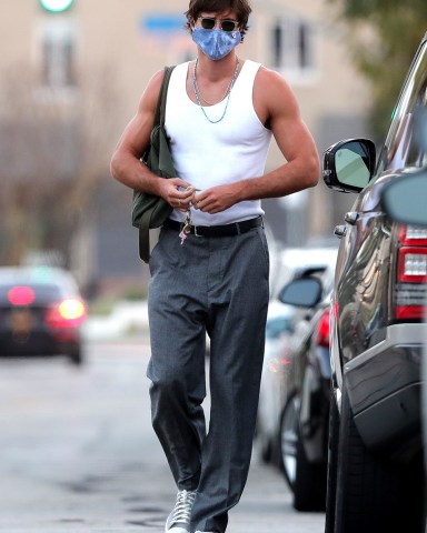 West Hollywood, CA  - *EXCLUSIVE*  - The sun's not out but the guns are! Jacob Elordi is spotted leaving Dogpound Gym after his workout session this afternoon.

Pictured: Jacob Elordi

BACKGRID USA 12 APRIL 2021 

USA: +1 310 798 9111 / usasales@backgrid.com

UK: +44 208 344 2007 / uksales@backgrid.com

*UK Clients - Pictures Containing Children
Please Pixelate Face Prior To Publication*