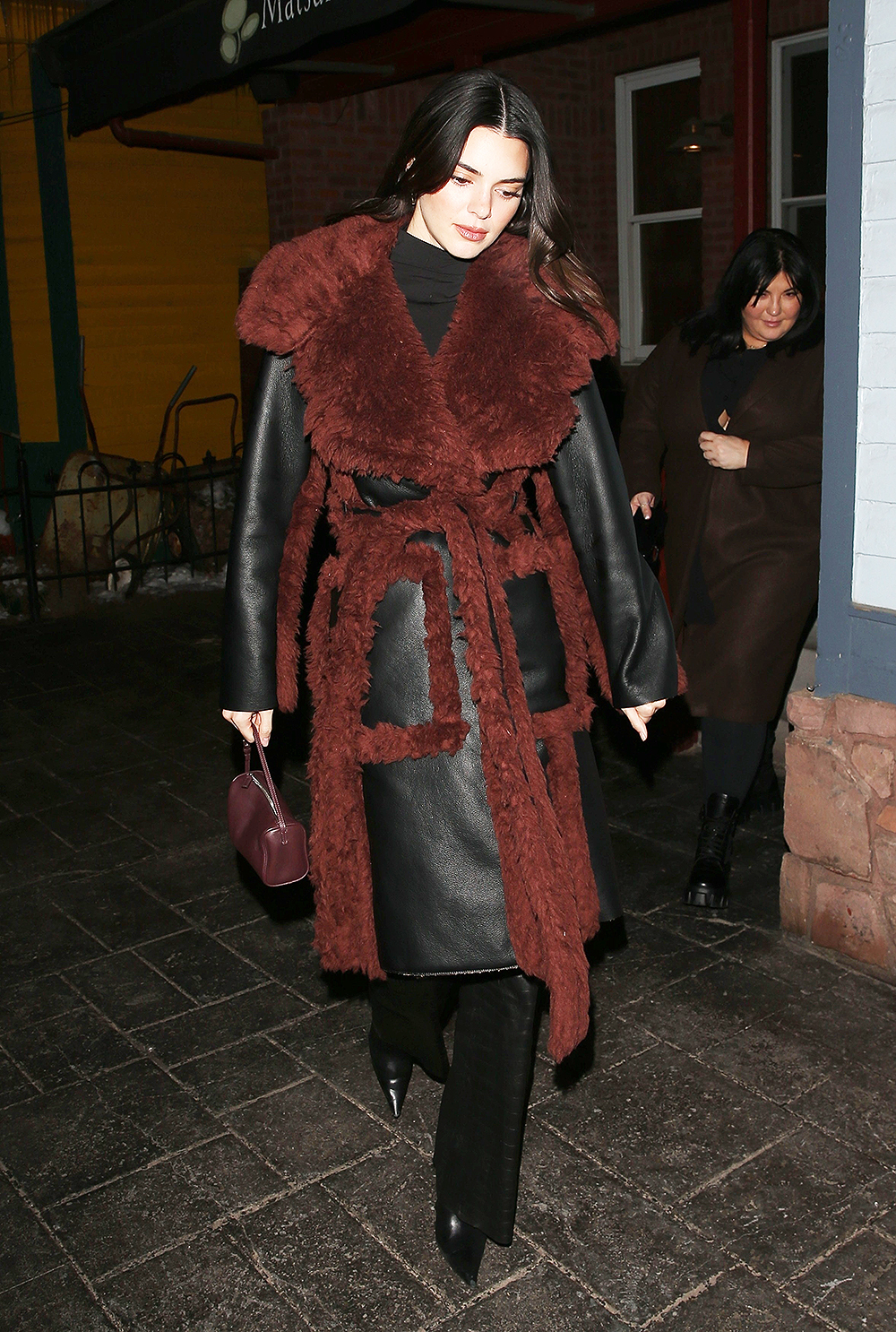 Aspen, CO  - *EXCLUSIVE*  -Kylie and Kendall Jenner enjoy a night out at 'Matsuhisa' Sushi Restaurant in Aspen Colorado.The sisters put on a very stylish display as they stepped out together for dinner on Sunday for a girl’s night out. Kylie stepped out in jeans, a white collared top with buttons and a fur bucket hat. Kendall put on a chic display in all black and a leather coat with fur lining.

Pictured: Kendall Jenner

BACKGRID USA 12 DECEMBER 2022 

BYLINE MUST READ: 1 / BACKGRID

USA: +1 310 798 9111 / usasales@backgrid.com

UK: +44 208 344 2007 / uksales@backgrid.com

*UK Clients - Pictures Containing Children
Please Pixelate Face Prior To Publication*