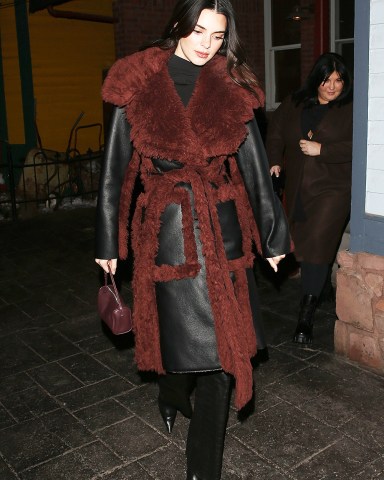 Aspen, CO  - *EXCLUSIVE*  -Kylie and Kendall Jenner enjoy a night out at 'Matsuhisa' Sushi Restaurant in Aspen Colorado.The sisters put on a very stylish display as they stepped out together for dinner on Sunday for a girl’s night out. Kylie stepped out in jeans, a white collared top with buttons and a fur bucket hat. Kendall put on a chic display in all black and a leather coat with fur lining.

Pictured: Kendall Jenner

BACKGRID USA 12 DECEMBER 2022 

BYLINE MUST READ: 1 / BACKGRID

USA: +1 310 798 9111 / usasales@backgrid.com

UK: +44 208 344 2007 / uksales@backgrid.com

*UK Clients - Pictures Containing Children
Please Pixelate Face Prior To Publication*