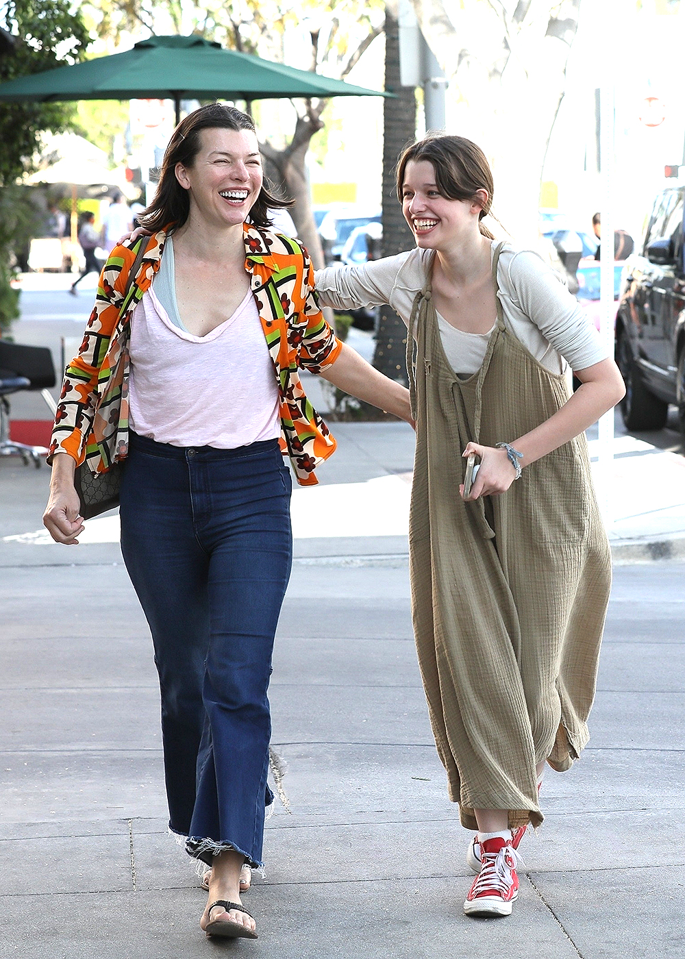 Beverly Hills, CA  - *EXCLUSIVE*  - Milla Jovovich spends some quality time with her 14-year-old daughter Ever in Beverly Hills. Ever gets silly for the cameras as the mother-daughter-duo go about their day together.

Pictured: Milla Jovovich

BACKGRID USA 26 APRIL 2022 

BYLINE MUST READ: BACKGRID

USA: +1 310 798 9111 / usasales@backgrid.com

UK: +44 208 344 2007 / uksales@backgrid.com

*UK Clients - Pictures Containing Children
Please Pixelate Face Prior To Publication*