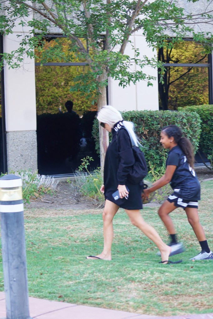 Kim Kardashian Hugs North After Basketball Practice