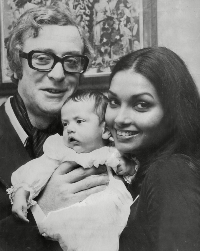 Michael Caine & Wife Shakira Caine Hold Baby Daughter Natasha