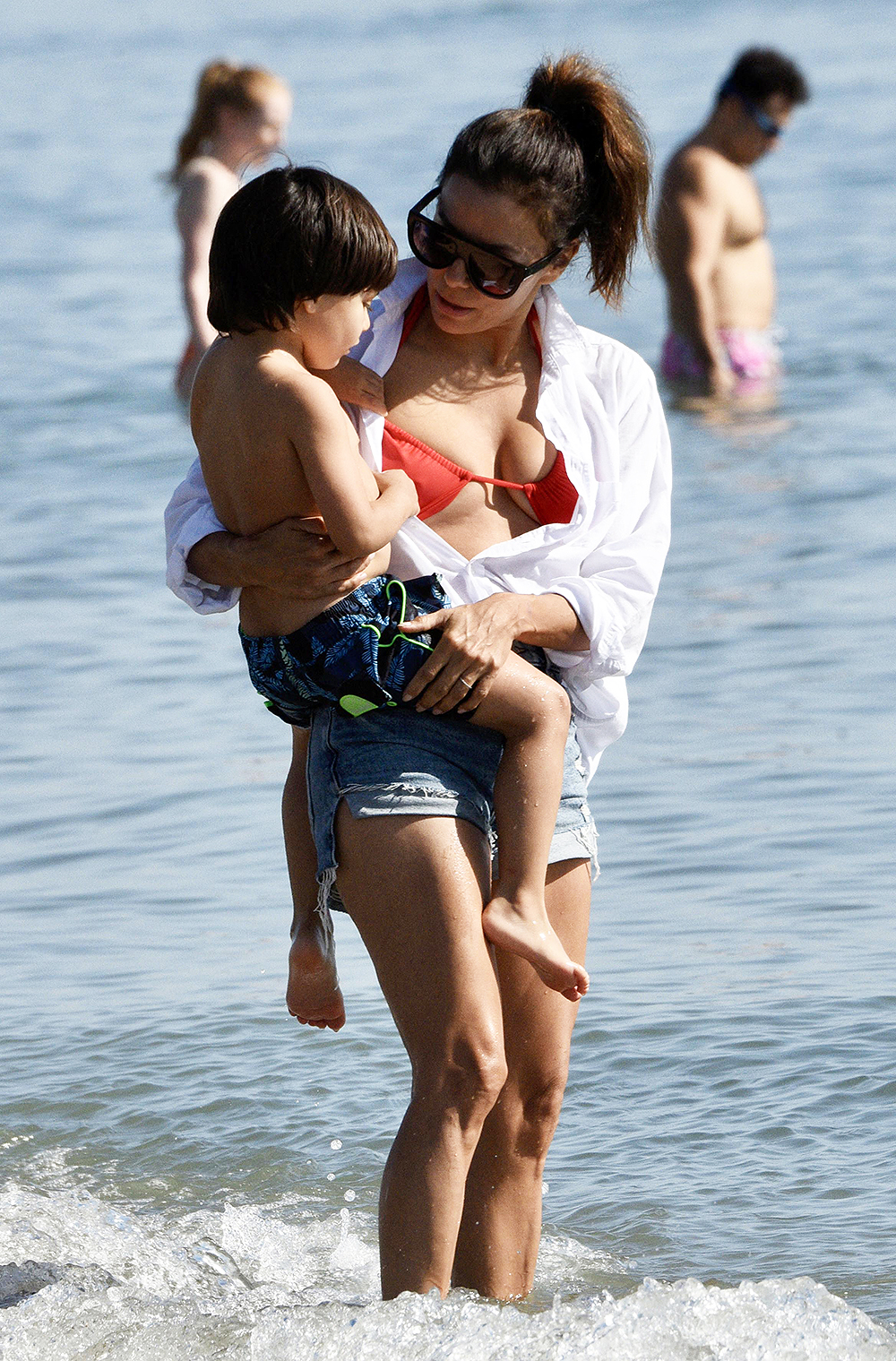 Eva Longoria hits the beach with her husband José Bastón and their 4 year old son Santiago Enrique Bastón while on vacation in Marbella, Spain