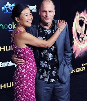 Woody Harrelson, Laura Louie