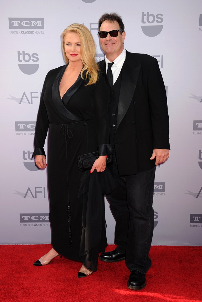 Dan Aykroyd & Donna Dixon on a red carpet