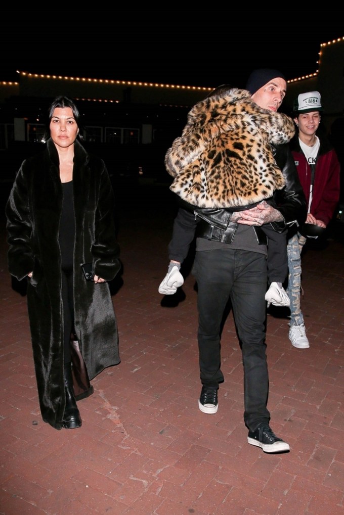 Travis Barker Carries Penelope