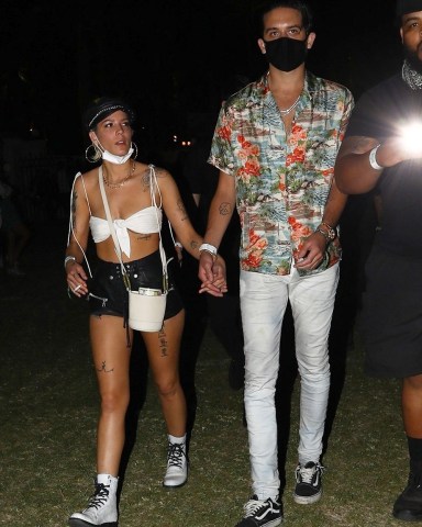 Indio, CA  - *EXCLUSIVE*  - Halsey and her boyfriend G-Eazy hold hands arriving for the evening Coachella. The pair wore face masks to combat the desert dust, although the singer did sneak in a quick smoke.Pictured: Halsey, G-EazyBACKGRID USA 15 APRIL 2018 USA: +1 310 798 9111 / usasales@backgrid.comUK: +44 208 344 2007 / uksales@backgrid.com*UK Clients - Pictures Containing ChildrenPlease Pixelate Face Prior To Publication*