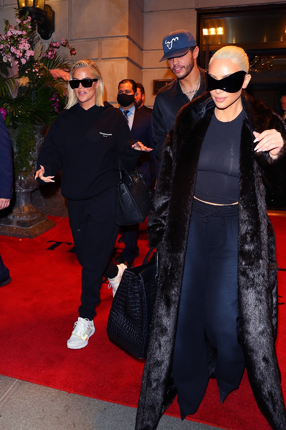 Kim Kardashian, Khloe Kardashian, and Pete Davidson check out of their hotel after attending the Met Gala