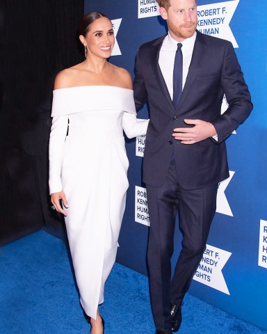 Prince Harry And Meghan Markle Attend Ripple Of Hope Gala Hilton Hotel, NY. 06 Dec 2022 Pictured: Prince Harry, Meghan Markle. Photo credit: Mayer RCF / MEGA TheMegaAgency.com +1 888 505 6342 (Mega Agency TagID: MEGA924100_001.jpg) [Photo via Mega Agency]