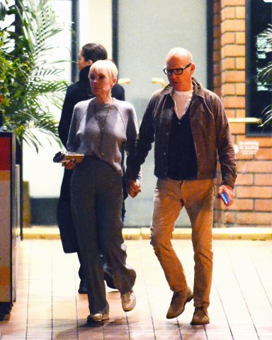 EXCLUSIVE: Michael Keaton and his girlfriend Marni Turner are seen leaving Toscana restaurant in Brentwood. 08 Dec 2022 Pictured: Michael Keaton and his girlfriend Marni Turner are seen leaving Toscana restaurant in Brentwood. Photo credit: MEGA TheMegaAgency.com +1 888 505 6342 (Mega Agency TagID: MEGA924778_001.jpg) [Photo via Mega Agency]