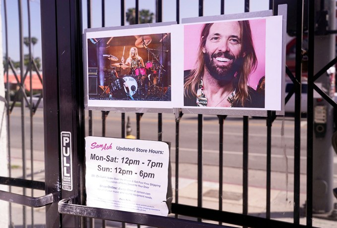 Photos Of Taylor Hawkins In Front Of Sam Ash Drum Shop