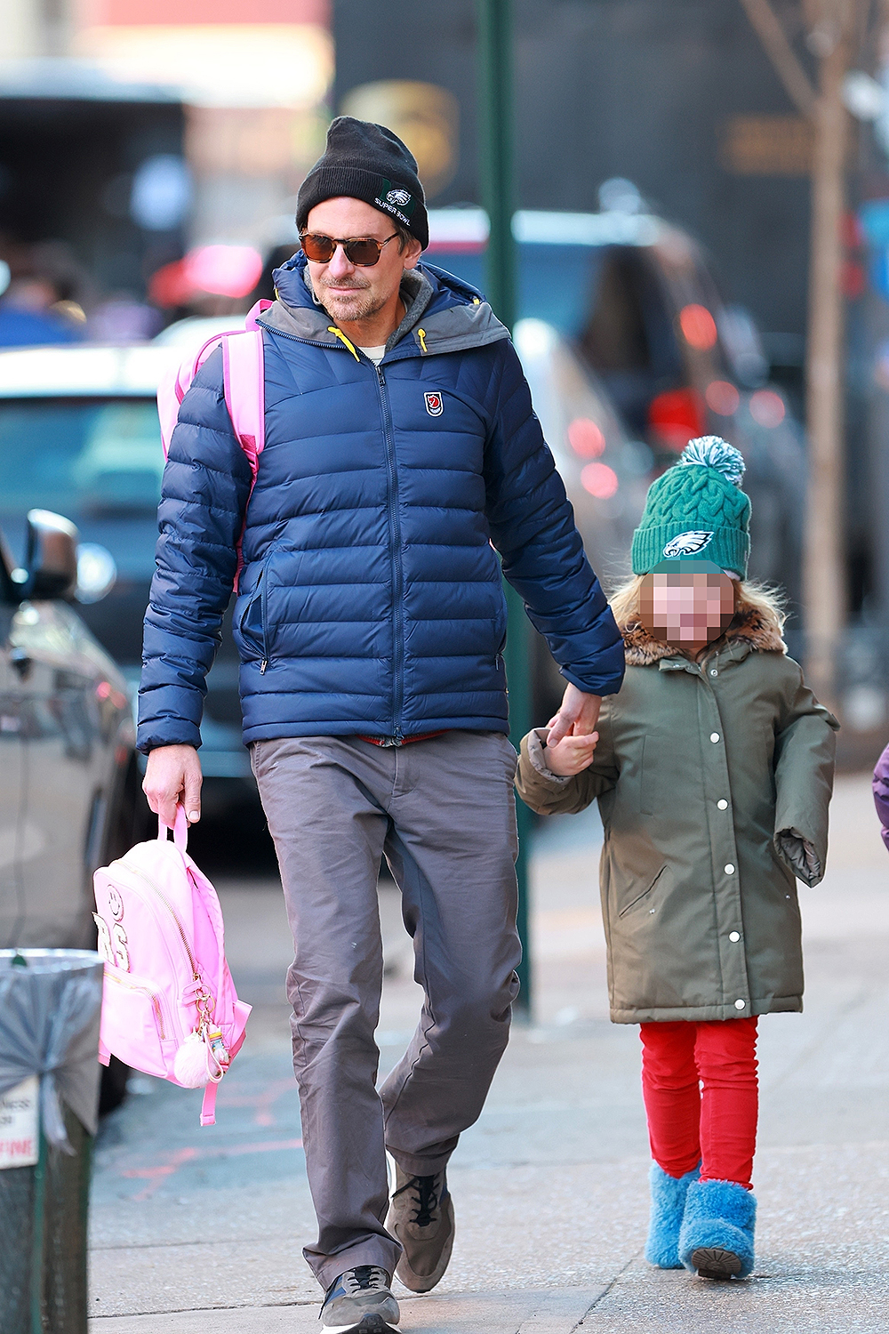 Bradley Cooper and his daughter Lea get dressed for the cold weather!