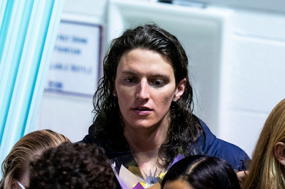 Pennsylvania's Lia Thomas looks on as she celebrates senior day with her teammates during a swim meet, in Philadelphia. Three years ago, she was on the men's team for Penn. This year, she is setting records as critics say it is not fair for her to swim against women after her transition
Penn Transgender Athlete Swimming, Philadelphia, United States - 08 Jan 2022