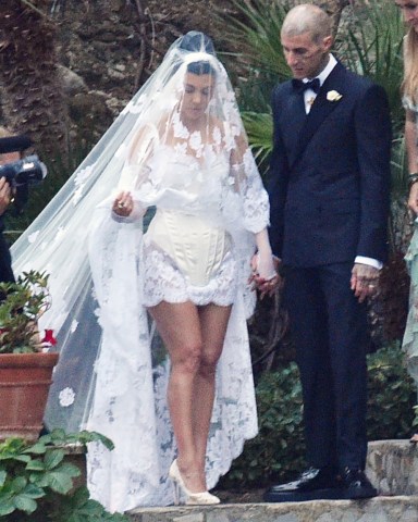 Portofino, ITALY - Kourtney Kardashian and Travis Barker get married in Portofino.Pictured: Kourtney Kardashian, Travis BarkerBACKGRID USA 22 MAY 2022 BYLINE MUST READ: Cobra Team / BACKGRIDUSA: +1 310 798 9111 / usasales@backgrid.comUK: +44 208 344 2007 / uksales@backgrid.com*UK Clients - Pictures Containing ChildrenPlease Pixelate Face Prior To Publication*