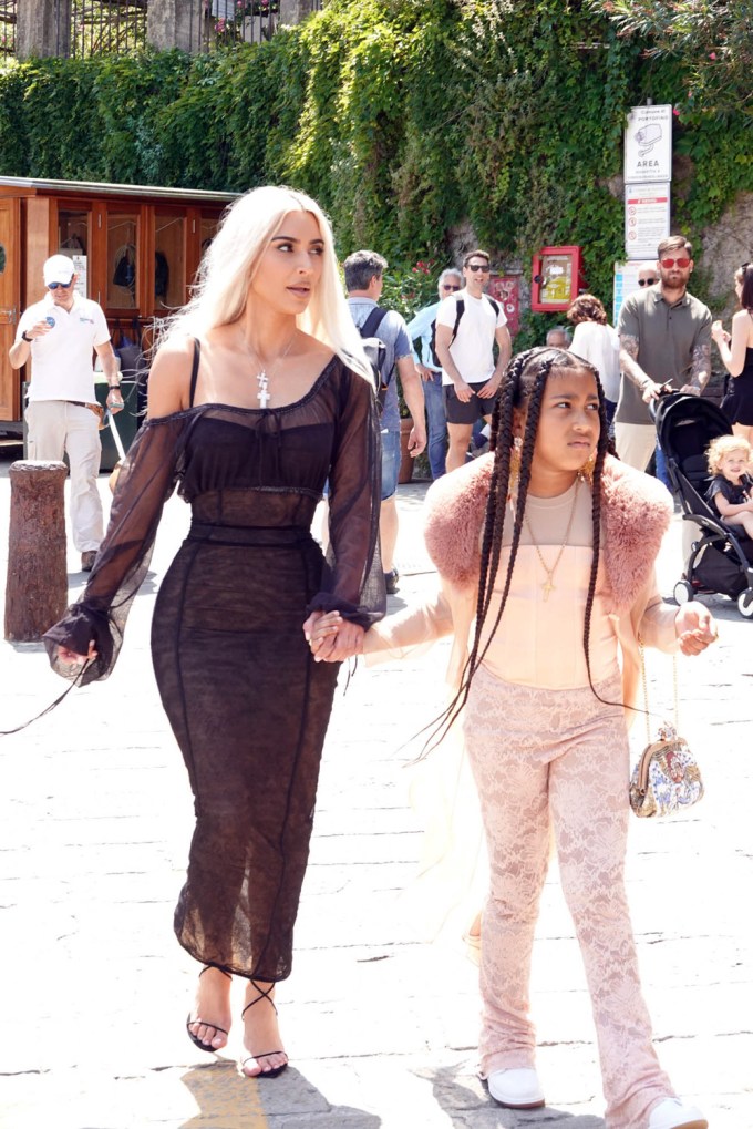 Kim Kardashian and North West holding hands