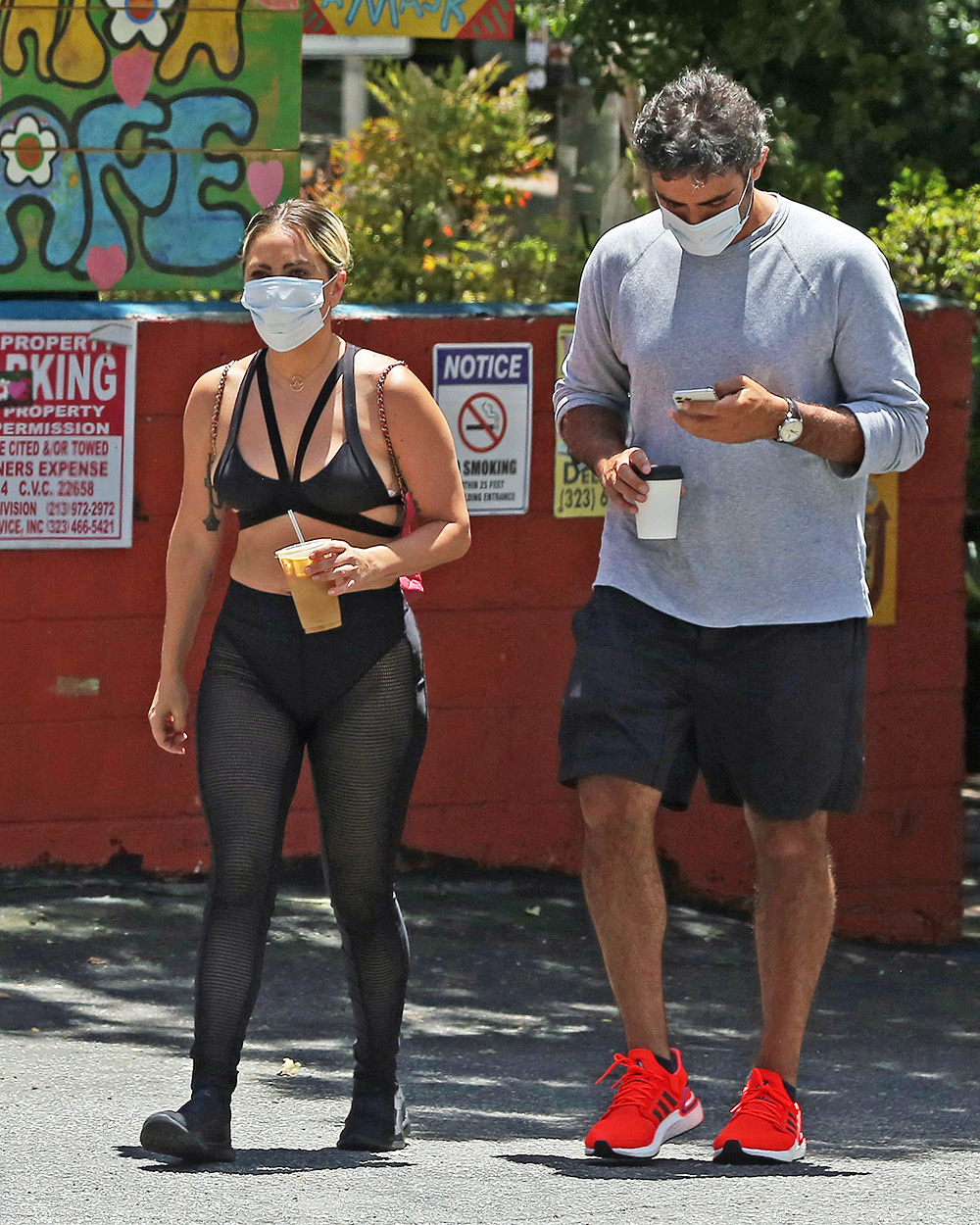 EXCLUSIVE: Lady Gaga and boyfriend Michael Polansky play it safe with masks on while out and about