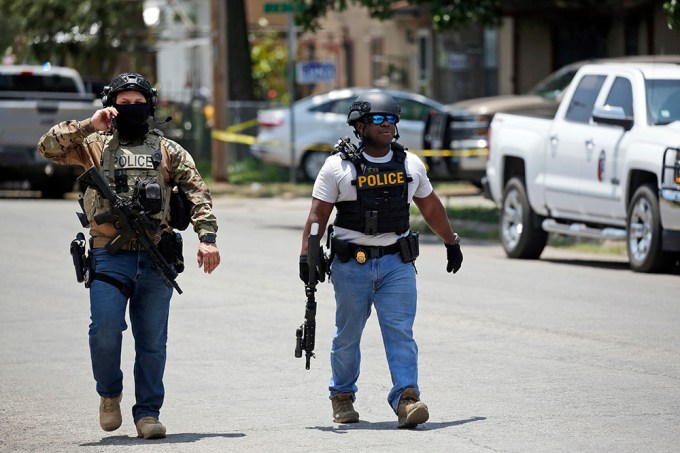 Police protect the school’s campus