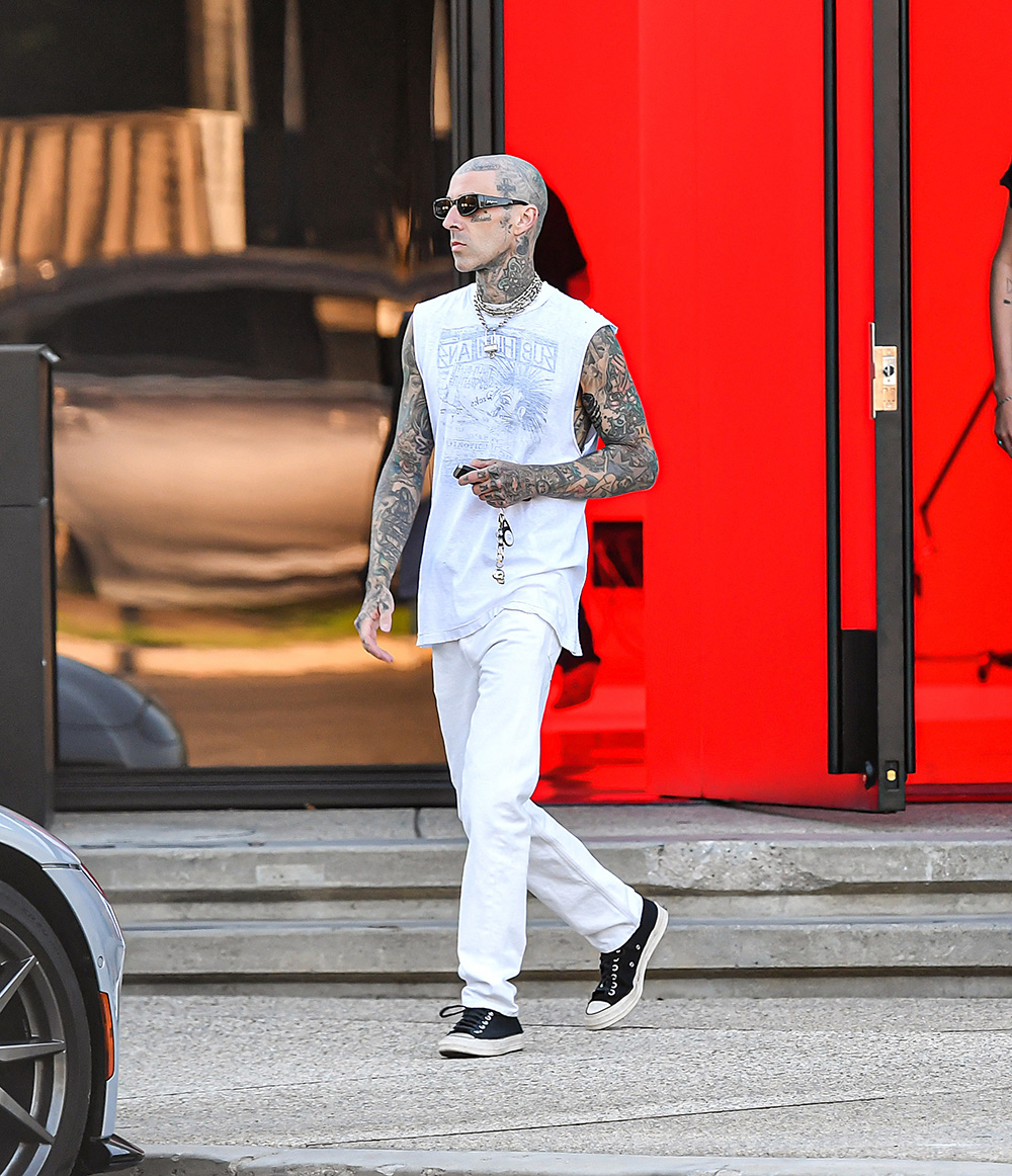 EXCLUSIVE: Travis Barker Looks Cool In White While Out With Son Landon In Calabasas, CA.