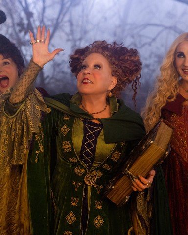 Kathy Najimy as Mary Sanderson, Bette Midler as Winifred Sanderson, and Sarah Jessica Parker as Sarah Sanderson in Disney's live-action HOCUS POCUS 2, exclusively on Disney+. Photo by Matt Kennedy. © 2022 Disney Enterprises, Inc. All Rights Reserved.