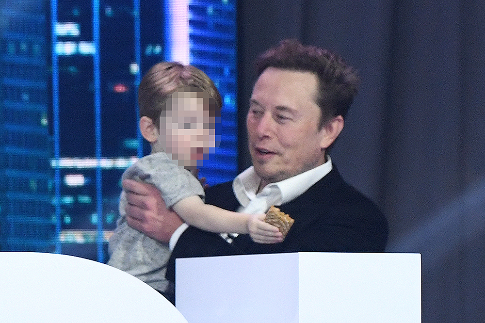 Elon Musk joins a panel discussion during a POSSIBLE marketing conference and sends the crowd wild as he plays with his adorable son onstage at the Fontainebleau Hotel in Miami